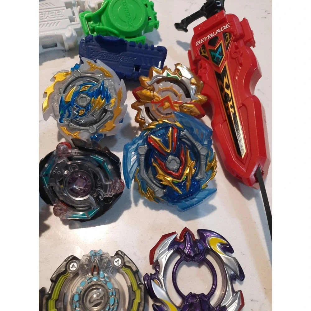 Lot Of 8 Beyblade And Different Parts